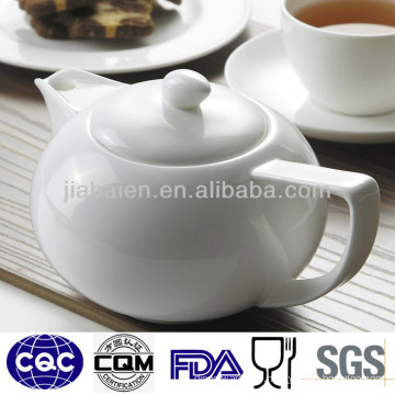 White elegant porcelain ceramic tea pot